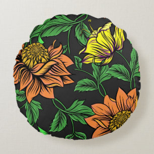 Heldergekleurde bloemen komen op uit een zwarte ac rond kussen