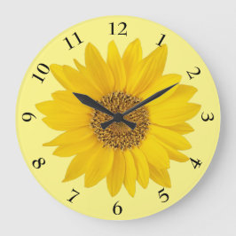 Heldergele zonnebloem op lichtgeel grote klok