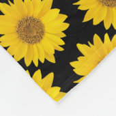 Heldergele zonnebloemen op zwarte achtergrond fleece deken (Hoek)