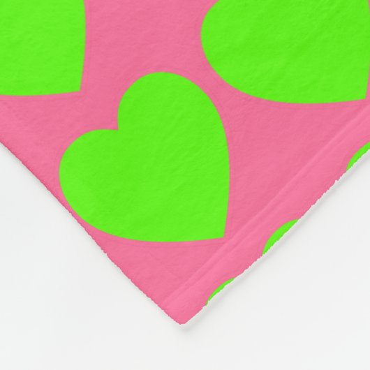 Heldergroene harten op roze fleece deken (Hoek)