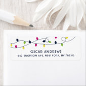 Helderheid en kleurrijke kerstverlichting feestdag etiket (Insitu)