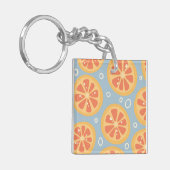 Helderheid en vette Oranje plakken op blauw Sleutelhanger (Voorkant Links)