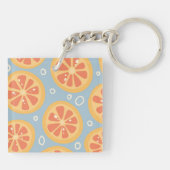 Helderheid en vette Oranje plakken op blauw Sleutelhanger (Achterkant)