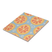 Helderheid en vette Oranje plakken op blauw Tegeltje (Zijkant)