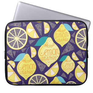 Helderheid van citroenen en klaveren op een donker laptop sleeve