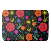 Helderkleurige bloemen op zwart badmat (Voorkant)