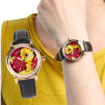 Helderrode en gele Gerber Daisies Horloge<br><div class="desc">Een leuk kleurrijk horlogegezicht versierd met kleurrijke gele en rode Gerber daisy foto's over een zwarte achtergrond met de lederen band. De witte getallen zijn een sjabloon die u kunt verwijderen / wissen. U kunt dit ontwerp ook overbrengen waar het past op een ander product in de schuifbalk, zoals de...</div>