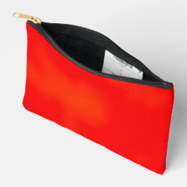 Helderrode ritssluitingstas op een witte achtergro etui