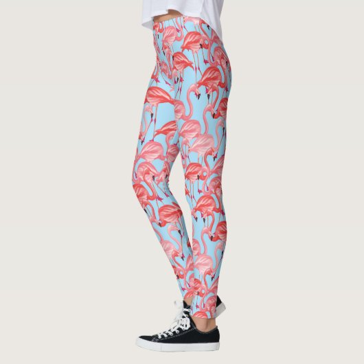 Helderroze lamingos op blauw 2 leggings (Links)