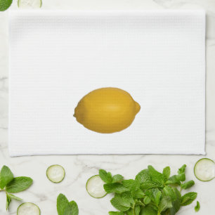 Hele rijpe lemon die keukenhanddoeken schildert