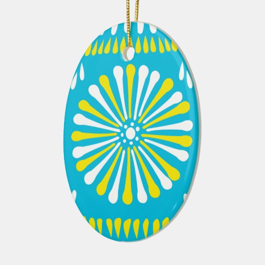 Hemelblauw met gele en witte melkvee keramisch ornament (Links)