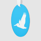 Hemelsblauwe en witte vliegende pelikaan ornament (voorkant)