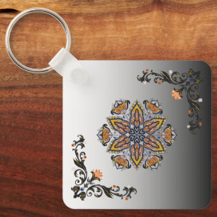Hemelse Bloei, Zwarte en Gouden Botanicals Sleutelhanger