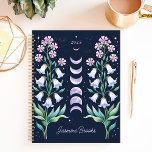 Hemelse Bloemen Maan Fase Aangepaste Naam Planner<br><div class="desc">Dit betoverende ontwerp is voorzien van een hemels maanfasemotief omlijst door delicate waterverf bloemen in zachte lavendel en roze tinten, tegen een diepzeemansachtergrond. Gepersonaliseerd met een aangepaste naam en het jaar 2025, combineert het kosmische charme met botanische elegantie. Ideaal voor spirituele zoekers, astrologieliefhebbers of iedereen die unieke en kunstzinnige design...</div>