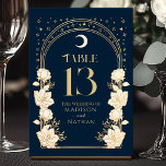 Hemelse Marine Elegante Arch Art Nouveau Huwelijk Kaart<br><div class="desc">Verhoog uw evenement met elegantie! Deze Art Nouveau tafelkaarten hebben gouden bogen, glinsterende sterren en delicate witte bloemen tegen een marineblauwe achtergrond - een tijdloos ontwerp voor bruiloften, diners of vieringen. Voeg vandaag nog een vleugje charme toe aan uw tafeldecor! Houd er rekening mee dat het goud op dit product...</div>