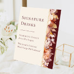 Herfst Bloemen Bourgondische bruiloft Signature Dr Reclamebord Met Voetstuk<br><div class="desc">Deze herfst bloemenbordeaux bruiloft handtekening drink voetstuk ontwerp is een dromerig ensemble dat de essentie van charme en moderne elegantie belichaamt. Herfst Met herfstbloemen en bladeren in herfstkleuren, geaccentueerd met gouden geometrische randen, biedt ons ontwerp een eenvoudige maar fascinerende esthetiek die perfect is voor uw zomer- of zomerviering. Tegen een...</div>