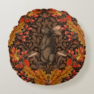 Herfst konijn op bruin rond kussen