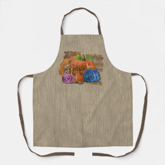 Herfst leopard drukt najaarpompoenen af op spelden schort