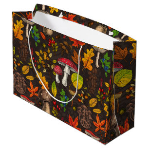 Herfst paddenstoelen, bladeren, noten en bessen op groot cadeauzakje