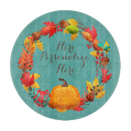 Herfst pompoen en herfstbladkrans blauwgroen sinaa snijplank