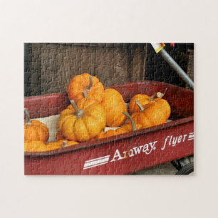 Herfst pompoenen in oude rode wagon legpuzzel