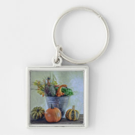 Herfst stilleven met pompoenen, bloemen sleutelhanger