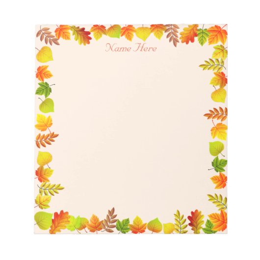 Herfstbladeren op lichtbeige notitieblok (Voorkant)