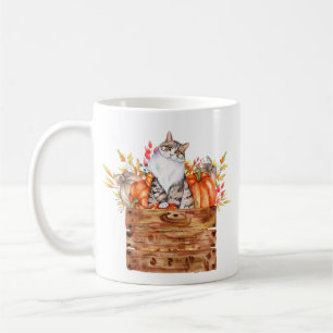 Herfstkat en pompoenen in doos  koffiemok