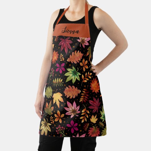 Herfstoogst herfstbladeren en gebladerte zwarte na schort (Insitu)