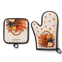 Herfstoogstmand met appels en bladeren