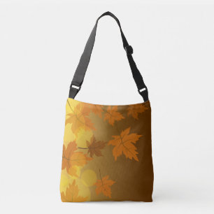 Herfstpatroon met vallende esdoornbladeren en boke crossbody tas