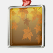 Herfstpatroon met vallende esdoornbladeren en boke metalen ornament (Links)