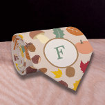 Herfstpatroon Monogram Stropdas<br><div class="desc">Een stropdas met een herfstpatroon inclusief esdoorn, beuk, eik en hazelblad, paddenstoel, eikel, pompoen, kastanjes en walnoten in herfstkleuren en een Monogram Letter. Een leuk cadeau voor een man die van natuur en bos houdt.</div>
