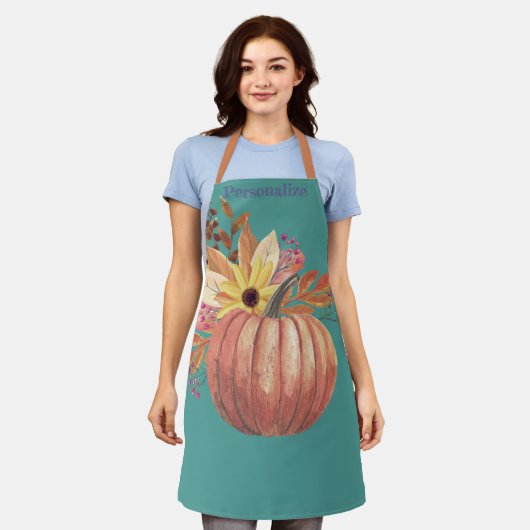 Herfstpompoen bloementerracotta sinaasappel en bla schort (Gedragen)