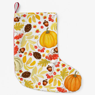 Herfstpompoenen, eikels,  achtergrond. kleine kerstsok