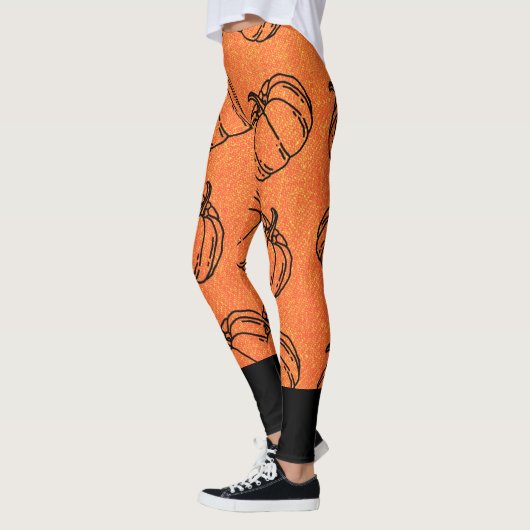 Herfstpompoenen op Oranje denim design met zwart Leggings (Links)