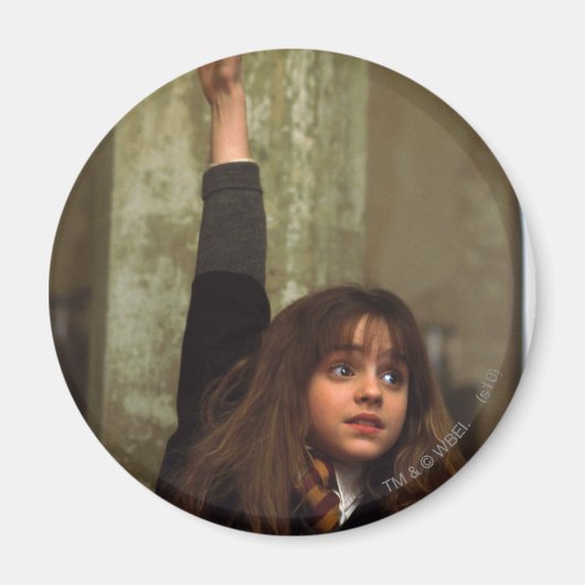 Hermione steekt haar hand op magneet (Voorkant)