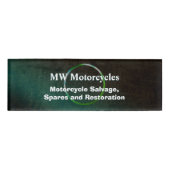 Herstel van de motorfiets, groen lederen blik, rin naambadge (Voorkant)