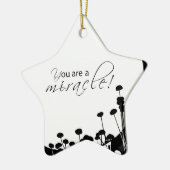 Herstelwonder, zwart en wit keramisch ornament (Links)