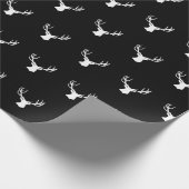 hert / buck jaagt op zwarte kerst cadeaupapier (Hoek)