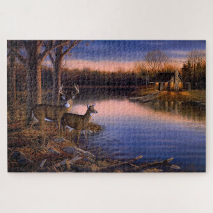 Herten bij de blokhut aan het meer legpuzzel