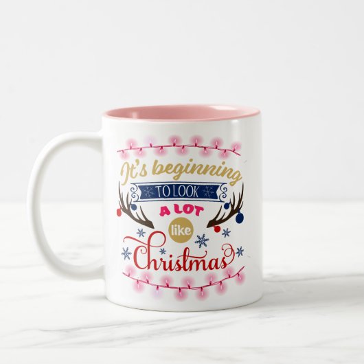 Het begint een beetje als kerstroze te lijken tweekleurige koffiemok (Links)