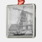 Het bestrijden van een brand in een windmolen bij  metalen ornament (Links)