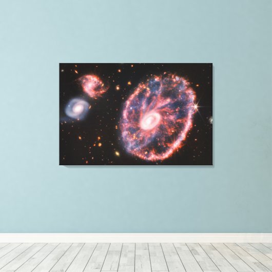 Het Cartwheel-sterrenstelsel en de bijbehorende st Canvas Afdruk (Insitu (Houten vloer))