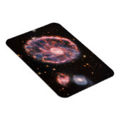 Het Cartwheel-sterrenstelsel en de bijbehorende st Magneet (Rechterzijde)