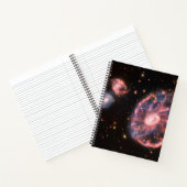 Het Cartwheel-sterrenstelsel en de bijbehorende st Notitieboek (Binnen)