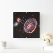 Het Cartwheel-sterrenstelsel en de bijbehorende st Vierkante Klok (Huis)