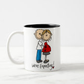 Het cijfer van de kruk wij verwachten tweekleurige koffiemok (Links)