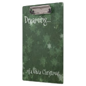 Het dromen van een witte kerstsnowflakes op groen klembord (Links)