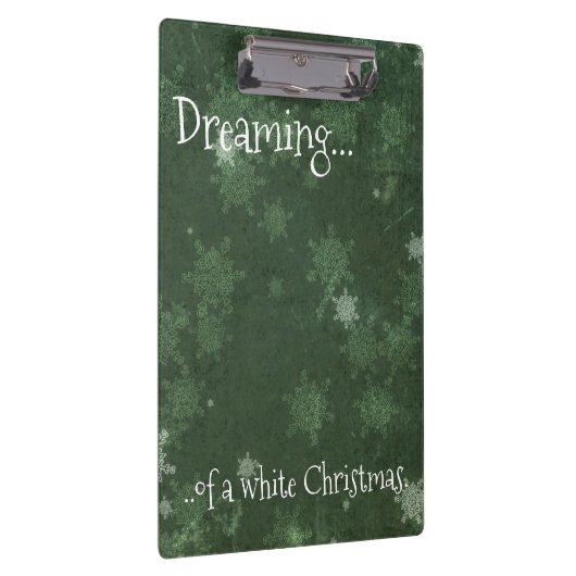 Het dromen van een witte kerstsnowflakes op groen klembord (Rechts)